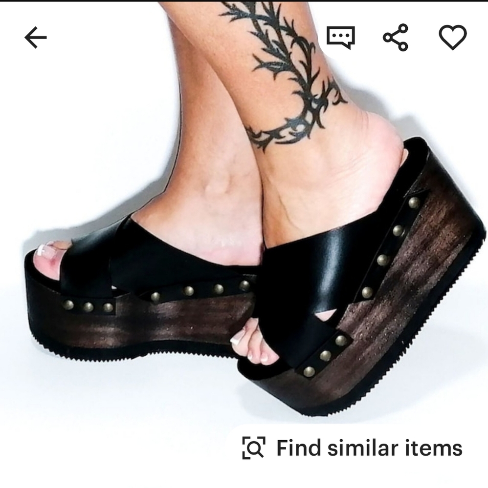 Sol Caleyo platform.hand made shoes. I paid $350. It doesn't say the size on it.